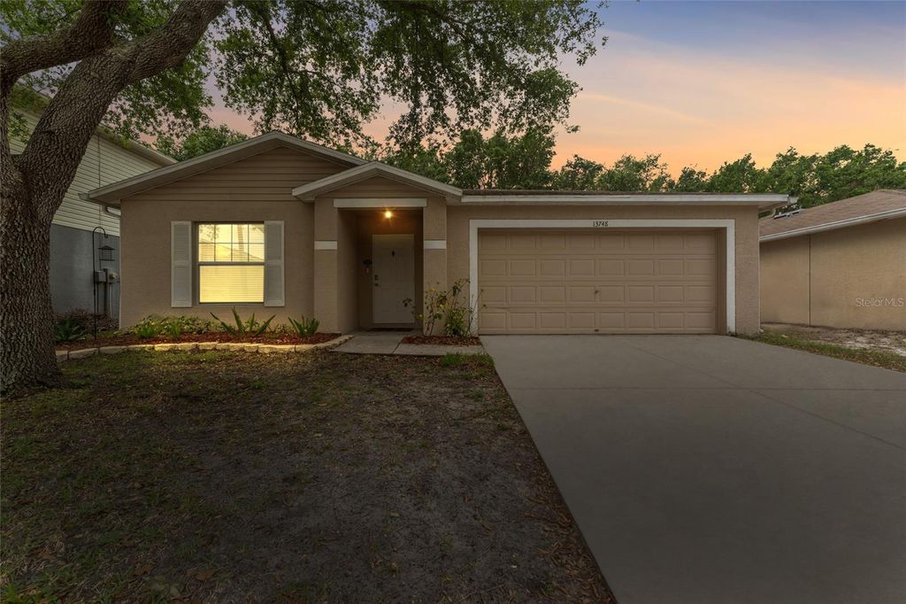 Photo of 13748 Tramore Drive, Odessa, FL 33556 (MLS # TB8370633)