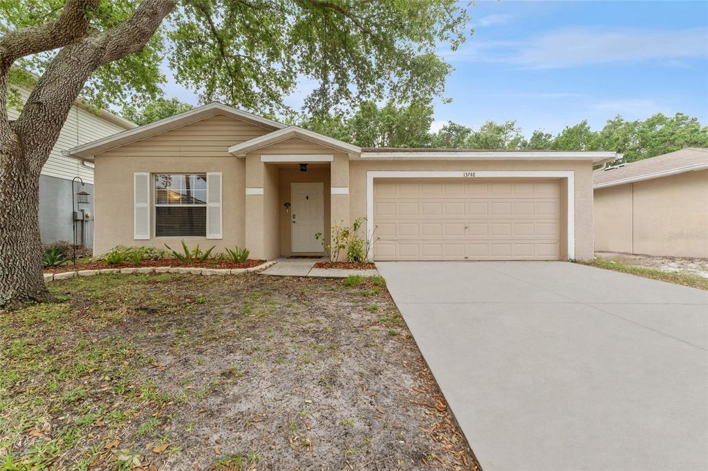 Photo of 13748 Tramore Drive, Odessa, FL 33556 (MLS # TB8370633)