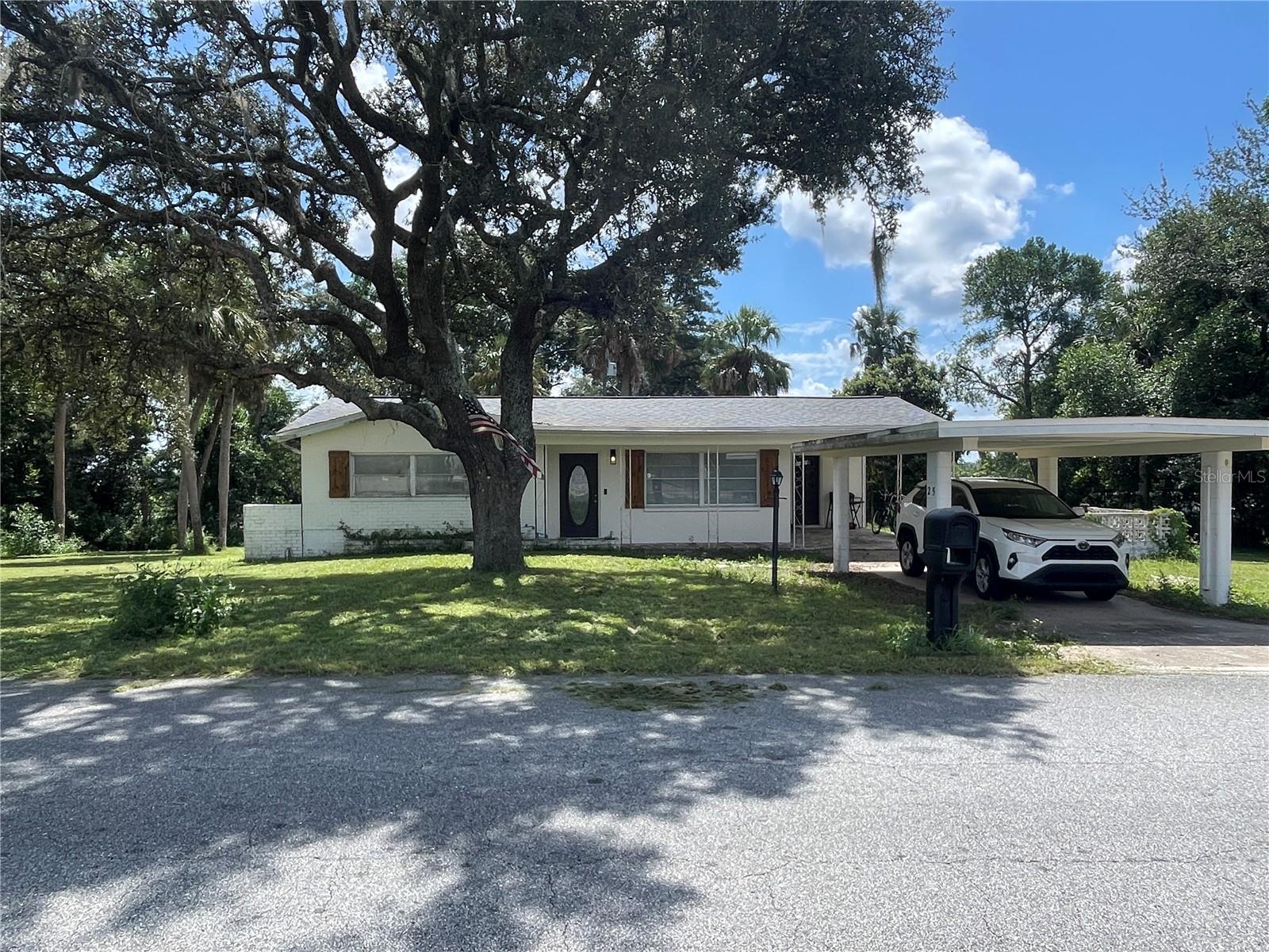 What a fabulous Location in Beverly Hills Florida. This Beautiful home sits on a hill. 2 Large Bedrooms and 1.5 Bathrooms. One Bathroom is updated. Laundry room and bonus flex room, could be 3rd bedroom. Newer Kitchen with SS Appliances and Granite Counter tops! Home sits on .41 acres with plenty of trees and landscape. You will love the semi private front patio and BBQ area and Shed out back. Close to everything including shopping, Walmart, hospitals, healthcare, boating, kayaking, natural springs and fishing. Home has carport and such a pretty walkway up to front door. Welcome HOME.
