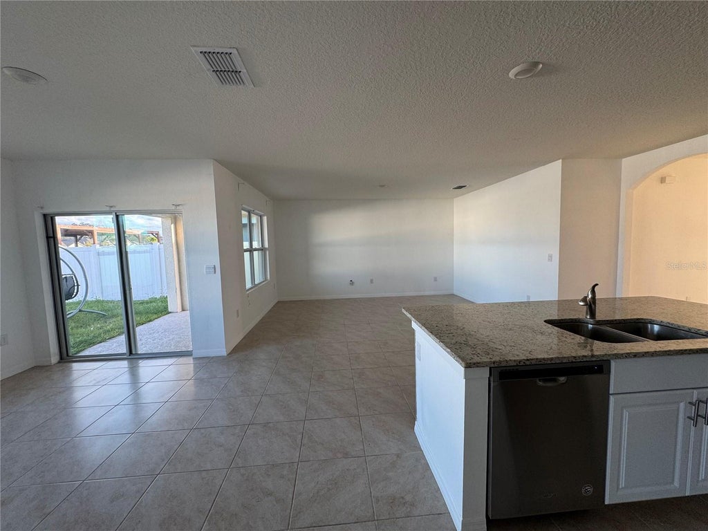 Photo of 1463 Riverboat Drive, Kissimmee, FL 34744 (MLS # O6453374)