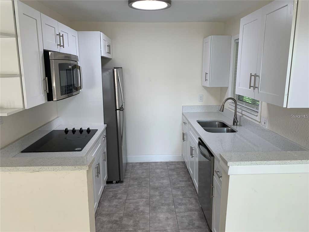 Photo of 17202 Sandalwood Drive #202, Wildwood, FL 34785 (MLS # G5116811)