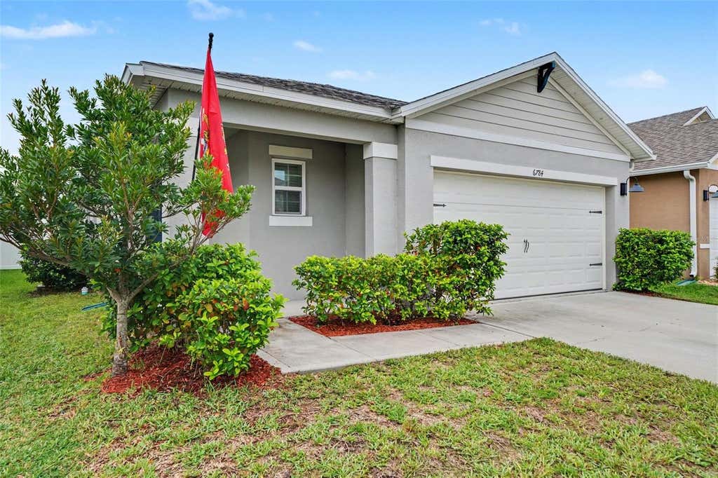 Photo of 6784 Huntleigh Hammock Road, Saint Cloud, FL 34773 (MLS # O6431710)