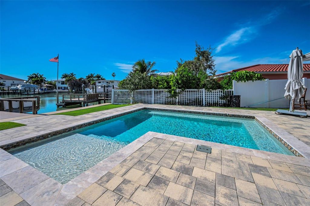 Photo of 10132 Yacht Club Drive, Treasure Island, FL 33706 (MLS # TB8468225)