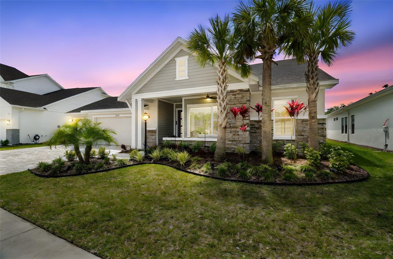 Welcome to this elite 5-bedroom, 4.5-bath + office + den, 4 car garage David Weekley home, perfectly situated on a spacious lot in the coveted gated community of Copeland Creek, within one of Tampa Bay’s top-rated school districts. With over 3,800 square feet of thoughtfully designed living space, this residence offers a rare blend of luxury, sustainability, and smart living. From the moment you arrive, you’ll notice the meticulous care and attention to detail - every upgrade has been professionally permitted and completed to the highest standard. Step inside to find soaring 10-foot ceilings, an open-concept great room anchored by a custom built-in entertainment wall equipped with modern fireplace and a $13,000 surround sound system, perfect for elevated movie nights or entertaining guests. The gourmet kitchen is a showstopper - complete with a massive center island, walk-in pantry, stainless appliances, and elegant finishes throughout. The main floor also features a dedicated office with built-in Murphy bed, ideal for a guest room or dual-purpose workspace. Upstairs, a spacious loft-style retreat provides a secondary gathering area, flanked by generously sized bedrooms and baths. The primary suite is a true sanctuary with huge dual walk-in closets, and a spa-like en-suite bath with extended dual sink vanity and spacious walk-in shower. Step outside to your expansive backyard oasis features an impressive high-end custom outdoor kitchen, beautifully integrated hardscaping, covered back porch, outdoor shower, and a full electric and plumbing setup for a future pool. The 4-car garage is outfitted with a Tesla charging station, a Culligan water softener system, epoxy flooring, and plenty of storage space. Along the wall, you’ll find a state-of-the-art Enphase Solar + Battery Backup System, including multiple battery units, backup panel, and full home integration. This investment in energy independence - valued at over $250,000 - means you can operate off-grid, reduce or eliminate electric bills, and stay powered during storms or outages. With hurricane season approaching, this is one of the most valuable and forward-thinking upgrades available in the Tampa Bay market today. Additionally, this home is upgraded with a full home security and monitoring system, electric blackout blinds, updated ceiling fans, and 2 high efficiency HVAC systems (zoned upstairs/downstairs). This home is eligible to assume the existing loan at 6.25%. With low HOA fees, a prestigious gated entry, and proximity to top schools, shopping, dining, and recreational areas—this is not just a home, it’s a lifestyle investment. *3D Matterport Virtual Tour Link*