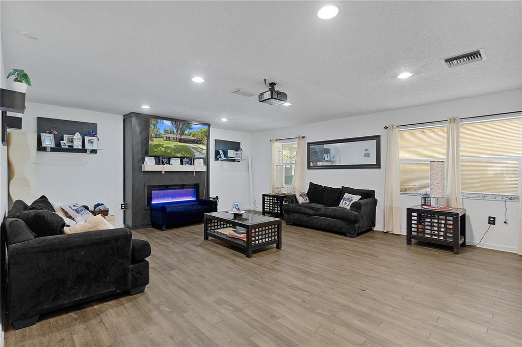 Photo of 1124 N Grant Avenue, Mount Dora, FL 32757 (MLS # O6443720)