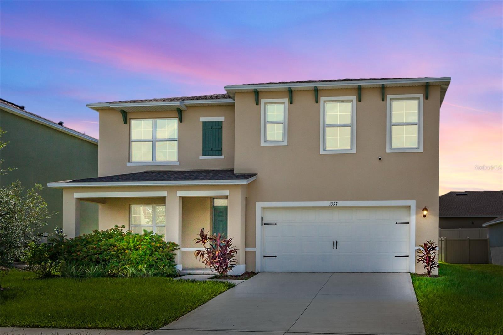 Upgraded & Move-In Ready – Just 25 Minutes from Disney! Welcome to this beautifully enhanced DR Horton Hayden model in the sought after Forest Lake community. With no carpet, a low HOA, and many thoughtful upgrades throughout, this home offers comfort, style, and convenience in one perfect package. The owner never moved in, so everything feels fresh and new. Standout upgrades include: luxury vinyl plank flooring on the stairs, loft, and all upstairs bedrooms; tile in the formal dining/office, first-floor guest room, and main living spaces; sealed grout for easy maintenance; custom interior paint (Sherwin Williams “Drift of Mist”); an extended irrigation system with Rain Bird remote control; a quiet, remote-controlled garage door opener; a full security system with cameras; and included refrigerator, washer, and dryer. Step inside to a light and airy open floor plan with neutral tones throughout. The front dining room can easily double as a home office. The chef’s kitchen is ideal for entertaining, featuring granite countertops, stainless steel appliances, and solid wood cabinets, and flows seamlessly into the spacious living area with views of the backyard. A private first-floor guest bedroom and full bath make a perfect in-law or guest suite. Upstairs, you’ll find four additional bedrooms, including a generous primary suite with two walk-in closets, dual vanities, granite counters, and a walk-in shower. The spacious loft offers endless possibilities, a second living room, office space, or playroom and the upstairs laundry adds everyday convenience. The backyard is fenced and ready for your personal touch, providing a great space for gatherings and outdoor fun. Beyond the front door, you’ll love the location, just minutes from local conveniences like Publix, Walmart, and a variety of retail shops. Dining options abound, from casual favorites like Chick-fil-A, Starbucks, and Chipotle to local gems serving everything from fresh seafood to authentic Mexican cuisine. And when it’s time for a bigger shopping trip or a night out, Posner Park and the bustling ChampionsGate area are both a short drive away, offering an array of restaurants, entertainment, and specialty stores. This move-in ready home combines modern finishes with a fantastic location—come see it today!