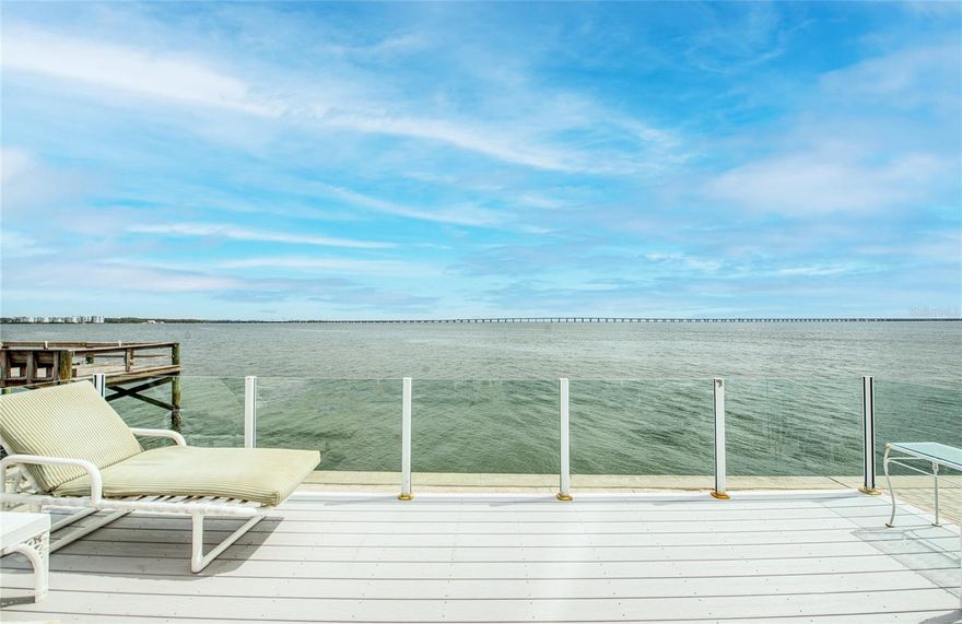 Unparalleled Tampa Bay Waterfront: Witness Nature's Spectacle Daily! Imagine waking up to the gentle lapping of Tampa Bay, where manatees and dolphins are your daily neighbors. This meticulously maintained Jacobsen Mobile Home offers an exceptionally rare opportunity to experience waterfront living at its finest. Embrace a life of effortless waterfront enjoyment in this spacious two-bedroom, two-bath home boasting 1,380 square feet of comfortable living space. The recently renovated kitchen features brand-new, stainless steel appliances including a refrigerator, microwave, and dishwasher. Enjoy the elegance and durability of engineered vinyl plank flooring throughout, along with the convenience of a new washer and dryer. For peace of mind, the vapor barrier and all ductwork have also been recently replaced. Step out onto your unique deck enclosed by glass, offering an unparalleled waterfront vantage point. Picture yourself savoring your morning coffee just steps from Tampa Bay, witnessing the captivating dance of local wildlife. Don't miss this extraordinary chance to own a piece of Tampa Bay paradise. This move-in ready home is being offered fully furnished for your immediate enjoyment. Discover the exceptional waterfront lifestyle offered at Bay Aristocrat Village! Schedule your visit today to experience this premier Pinellas County manufactured home community firsthand, where you own your property. Enjoy a low monthly maintenance fee of just $360, covering lawn care, trash removal, water, and sewer services. Bay Aristocrat Village is an active 55+ retirement community boasting an array of desirable amenities, including a heated pool, relaxing Jacuzzi, shuffleboard courts, a vibrant clubhouse with diverse activities, and the unparalleled pleasure of two private fishing piers directly on Tampa Bay. Conveniently situated in beautiful Bay Aristocrat Village, you'll find yourself just minutes from world-renowned Clearwater Beach, upscale shopping destinations, a variety of restaurants, major medical facilities, and easy access to two international airports. Only one cat per home is allowed. No dogs allowed. Contact community office regarding (ESA) pets.