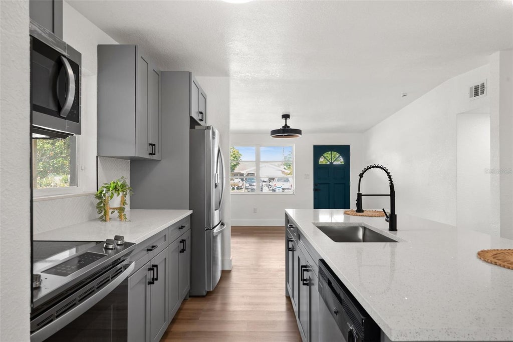Photo of 9596 Groveland Street, Seminole, FL 33772 (MLS # O6435839)