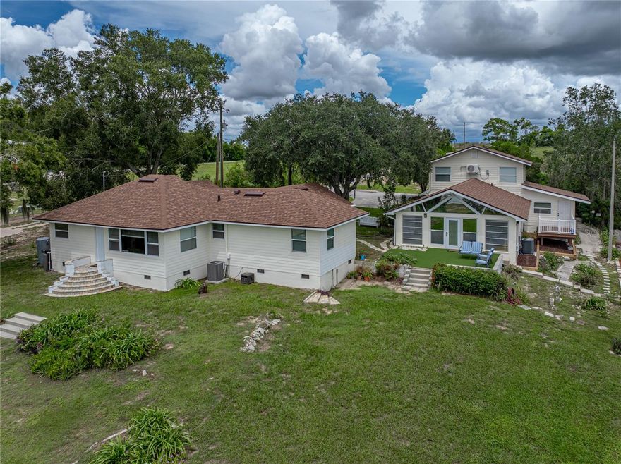 Lake Starr Property with Multiple Dwellings & Endless Possibilities!
Discover a rare opportunity to own 3.39 acres of lakefront living on the shores of Lake Starr. This unique property features a 3 bedroom, 2 bath home offering stunning lake views and even a view of Bok Tower! The spacious open living and dining area are great for entertaining. You’ll also enjoy a split bedroom layout, and charming pine hardwood floors. Recent upgrades include updated windows and doors, rewired electric, Hardie board siding, and additional insulation. New roof (2024) and new pump for well (2025)
In addition to the main home, the property includes a versatile guest dwelling with multiple rental options: a fully furnished studio apartment upstairs, a 2 bedroom/1 bath apartment downstairs, plus a shared recreation room complete with a sitting area, ping pong, pool table, sauna, full bath, and an open patio overlooking the lake and tennis court.
For your cars, boat, camper or toys there’s a 24’ x 40’ three-bay detached garage/workshop with plenty of storage.
This property is ideal for a family compound, multigenerational living, or as an income-producing investment property. Conveniently located near shopping, dining, and medical facilities, it combines privacy with accessibility. Close to Legoland and Winter Haven.
Don’t miss this one-of-a-kind lakefront opportunity!