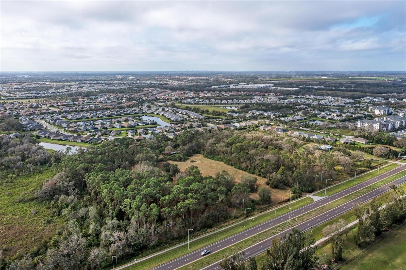 Do not miss this MASSIVE POTENTIAL opportunity to own highly desired land in the expanding Lakewood Ranch area of SR 64. This property is located between the Eagle Trace Community and the Pope Road roundabout with the newly built Publix plaza is. This parcel is 11.5+/- acres. The property is surrounded by thousands of homes and is just waiting to be developed. This property is currently zoned A with future land use UF-3. There are two separate properties for sale side by side that must be sold together. Please see the accompanying listing 12108 SR 64 E for the other parcel for sale.