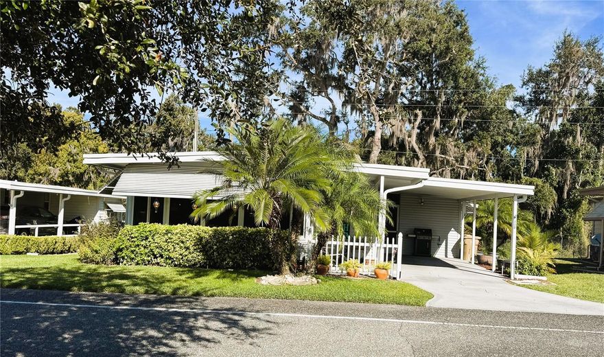 Beautifully Updated 2-Bedroom, 2-Bath Home with Serene River and Nature Views
Enjoy peaceful living surrounded by nature in this beautifully remodeled 2-bedroom, 2-bath home featuring stunning views of the river, woods, and a large open field where wild turkeys, and other wildlife are daily visitors. Thoughtfully updated inside and out, this residence blends modern comfort with natural beauty.
The bright, open layout features high-end laminate flooring, crown molding, beadboard accents, and chair rails throughout. The spacious kitchen was remodeled in 2018–2019 and offers an island, stainless steel appliances, refinished cabinets, a quartz double sink with updated faucets, and tile flooring. Both bathrooms have been fully updated with walk-in showers, new toilets, modern fixtures, and skylights that fill each space with natural light.
Enjoy year-round comfort in the Florida room, which is fully under heat and air, or relax on one of two inviting porches — a cozy west-side porch off the main bedroom, perfect for sunsets, and a large screened and covered east-side porch overlooking the river and woods, ideal for morning coffee or evening wine.
Additional recent updates include a new roof installed in November 2024, new panorama awnings on all windows, and a brand-new A/C system installed in November 2025. The home also features all new energy-efficient windows, new baseboards throughout, an electric fireplace with heater, and updated electrical outlets and switches.
This move-in-ready home offers the perfect combination of modern upgrades, low-maintenance living, and a peaceful setting surrounded by natural beauty — truly a rare find.

Hawthorne at Leesburg is a vibrant 55+ community that blends comfort, convenience, and affordability. For just $346 a month, residents enjoy a maintenance-free lifestyle that includes water, sewer, lawn care, emergency services, and access to a wealth of resort-style amenities plus secure RV and boat storage. The expansive clubhouse is the social hub of the community, offering over 100 organized activities, a welcoming lounge, card rooms, billiards, a fitness center, a library, and a fine arts studio. A dedicated program coordinator ensures there’s always something fun and engaging on the calendar. For those who love the water, the private marina offers more than 120 boat slips with direct access to the beautiful Harris Chain of Lakes. Safety and peace of mind come standard, thanks to a 24/7 on-site team of state-certified firefighter/EMTs, emergency vehicles, and in-home emergency response buttons. Surrounded by natural beauty, the community features scenic walking trails, serene lake views, and plenty of opportunities for fishing and boating. The golf cart-friendly streets make it easy to explore nearby shopping, dining, and medical facilities. With a sparkling pool, endless recreational options, and a warm, welcoming atmosphere, Hawthorne at Leesburg isn’t just a place to live it’s a lifestyle. Schedule your showing today and discover the perfect blend of comfort, community, and convenience. This move-in-ready home offers the perfect combination of modern upgrades, low-maintenance living, and a peaceful setting surrounded by natural beauty — truly a rare find.