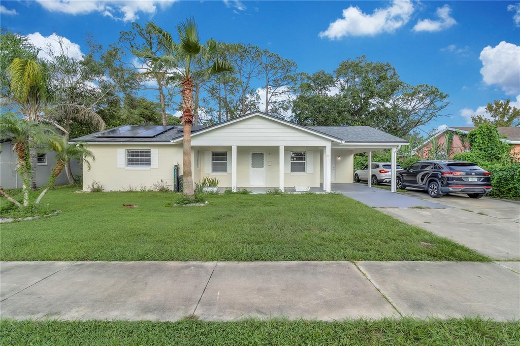 Photo of 1345 S Oxalis Ave, Orlando, FL 32807 (MLS # O6441369)