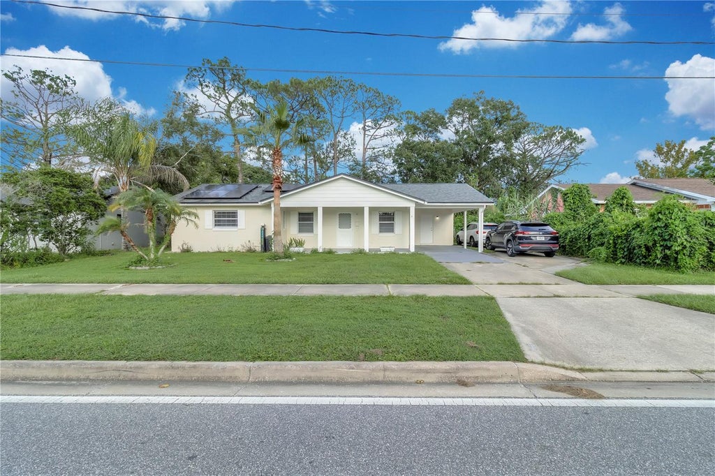 Photo of 1345 S Oxalis Ave, Orlando, FL 32807 (MLS # O6441369)