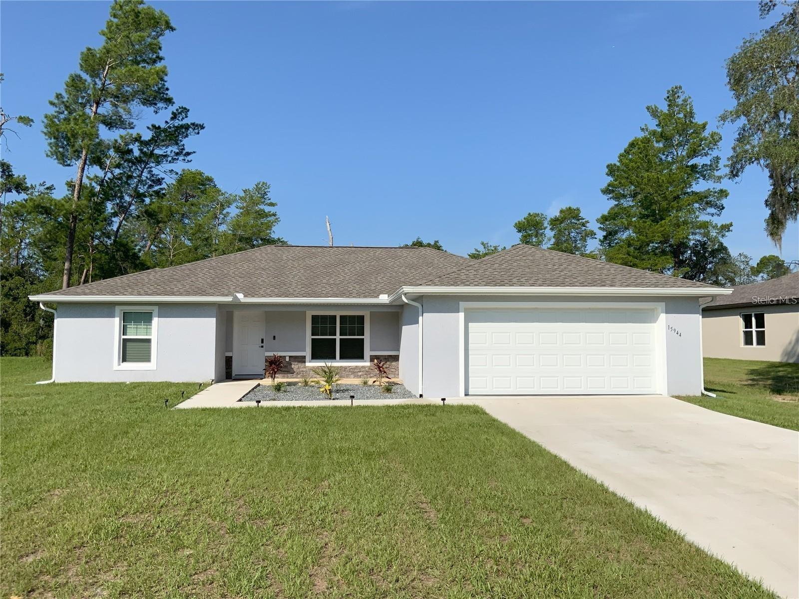 Built in 2023, this stunning home features 3 spacious bedrooms, 2 full bathrooms, and a 2 car garage and it’s ideal for families seeking a move-in ready space. Step inside to a bright, open-concept layout that’s perfect for both entertaining and everyday living. The kitchen boasts granite countertops, modern cabinetry, and a large island that connects to the dining and living areas. Durable laminate flooring spans the main living spaces for easy upkeep, while plush carpet in the bedrooms adds warmth and comfort.
Split floor plan ensures privacy, with the primary suite offering an en suite bath and a generous walk-in closet. Additional highlights include an indoor laundry area, energy-efficient construction, and a prime location close to shopping, schools, and major highways.
