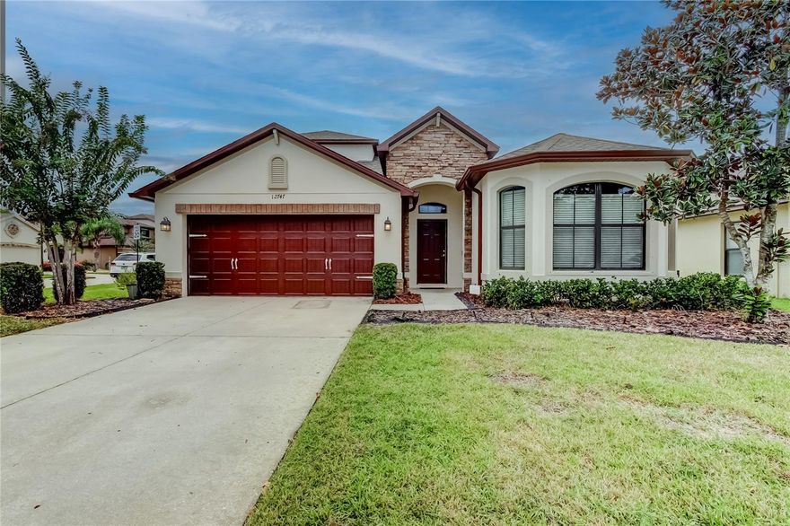 Welcome to Trinity East, ONE OF THE PREMIER COMMUNITIES IN TRINITY, FL! This spacious 4-bedroom, 3-bathroom home offers an IDEAL FLOOR PLAN FOR FAMILIES AND THOSE LOOKING FOR MULTIGENERATIONAL LIVING. THE SOLAR PANELS ARE PAID IN FULL AND WILL SAVE YOU LOTS OF MONEY on the monthly electric bill! INSIDE, YOU’LL LOVE THE OPEN FLOOR PLAN, FILLED WITH NATURAL LIGHT and designed for entertaining, family gatherings and fun times! The interior and exterior has been freshly painted. The HUGE KITCHEN IS A CHEF’S DREAM, COMPLETE WITH GRANITE COUNTERTOPS, AMPLE CABINETRY, NEW COOKTOP STOVE, AND PLENTY OF STORAGE AND SEATING SPACE. UPSTAIRS, A VERSATILE LOFT SPACE WITH LARGE WALK IN CLOSET OFFERS ENDLESS POSSIBILITIES—it can serve as a cozy in-law suite, a private retreat for guests, or the perfect home office. With four generously sized bedrooms (3 bedrooms downstairs and 1 upstairs) and three full bathrooms (2 are downstairs and one is upstairs), there is  room for everyone to spread out and feel at home. This true beauty features dual zone air conditioning with a unit dedicated to each floor.  Step outside to enjoy the PRIVACY OF THE VINYL FENCED YARD. The gated community amenities include a beautiful entry way and COMMUNITY PLAYGROUND. Whether you’re looking for a home that GROWS WITH YOUR FAMILY, SPACE FOR LOVED ONES TO STAY LONG-TERM, OR SIMPLY A WELCOMING HOME IN A SOUGHT-AFTER LOCATION, this Trinity East gem checks all the boxes. The house is NOT IN A FLOOD ZONE AND HAS HURRICANE SHUTTERS for additional peace of mind. Tampa International Airport is less than 30 minutes away. The community has an abundance of restaurants, shopping, medical facilities, a state of the art YMCA and more! Gas is available in this community. OUR BUYERS CONTRACT FELL THROUGH SO WE ARE BACK ON THE MARKET.