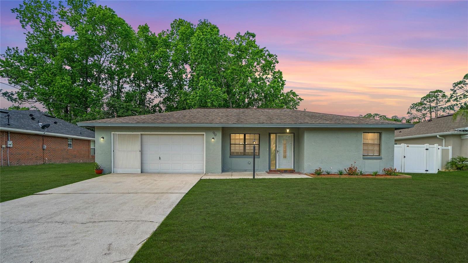 Charming 3-Bedroom Home Just Minutes from Flagler Beach – Move-In Ready! Listed at $279,900, this beautifully maintained 3-bedroom, 2-bath cement block home offers the perfect blend of comfort, convenience, and location. Boasting an open floor plan with 1,481 square feet of living space, this home is ideal for families, retirees, or anyone looking to enjoy Florida living at its best. Highlights include: Spacious 2-car garage Almost new water filter system (1.5 years old). Newer roof (approximately 10 years old) Fenced backyard with a shed – great for pets, storage, or gardening Open-concept layout perfect for entertaining Just 12 miles to Flagler Beach, 10 miles to I-95, and only 1 mile from the golf course Don't miss this opportunity to own a solid, stylish home in a desirable location.