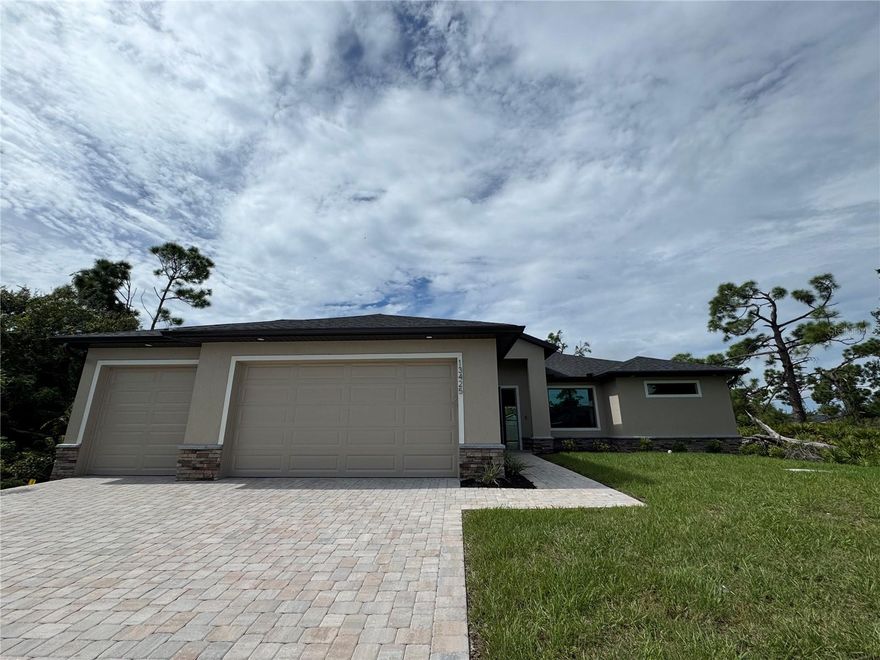 Be the first to live in this stunning new construction by Douglas Brooke Homes. This spacious 4-bedroom, 2-bathroom home features over over 1700 square feet of thoughtfully designed living space, complete with a 3-car garage and private pool.

Step inside to an open-concept floor plan with soaring ceilings and elegant wood-look tile throughout the main living areas. The great room flows seamlessly into a chef-inspired kitchen with quartz countertops, stainless steel appliances, a large center island, and a walk-in pantry. A vaulted-ceiling dining area sits just off the kitchen, overlooking the backyard and pool.

The primary suite offers dual walk-in closets and a spa-style bathroom with double vanities and a glass walk-in shower. Three additional bedrooms and a full guest bathroom provide plenty of room for family or visitors.

Enjoy peace of mind with impact-resistant windows and doors, a smart home system, in-wall pest control, and a pool alarm. The home also includes a spacious laundry room with sink and ample storage throughout.

Conveniently located near shopping, restaurants, hospitals, boat ramps, and more.