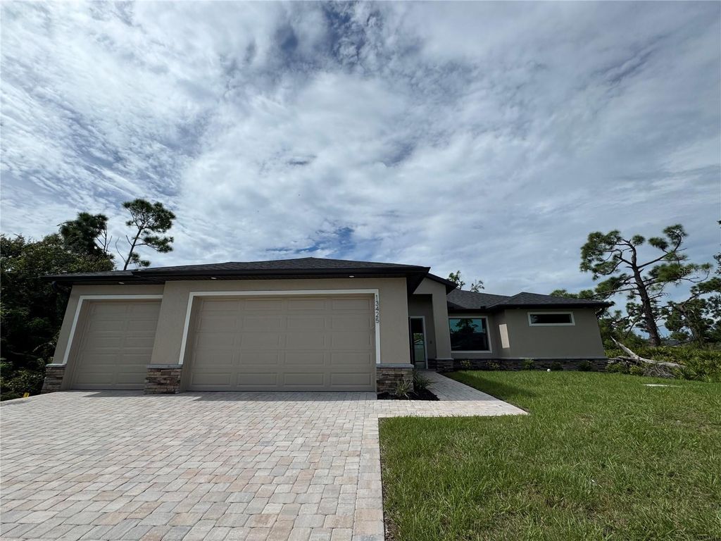 Photo of 13425 Yager Lane, Port Charlotte, FL 33981 (MLS # C7514657)