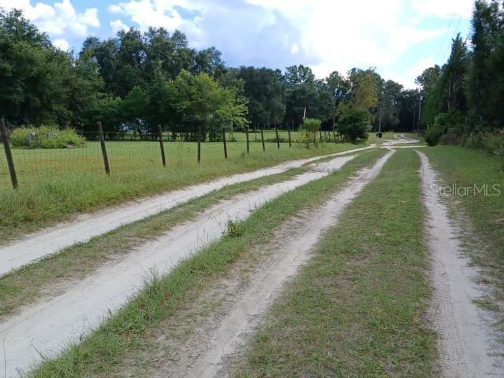 Photo of 6104 NW 268th Terrace, Newberry, FL 32669 (MLS # V4948319)