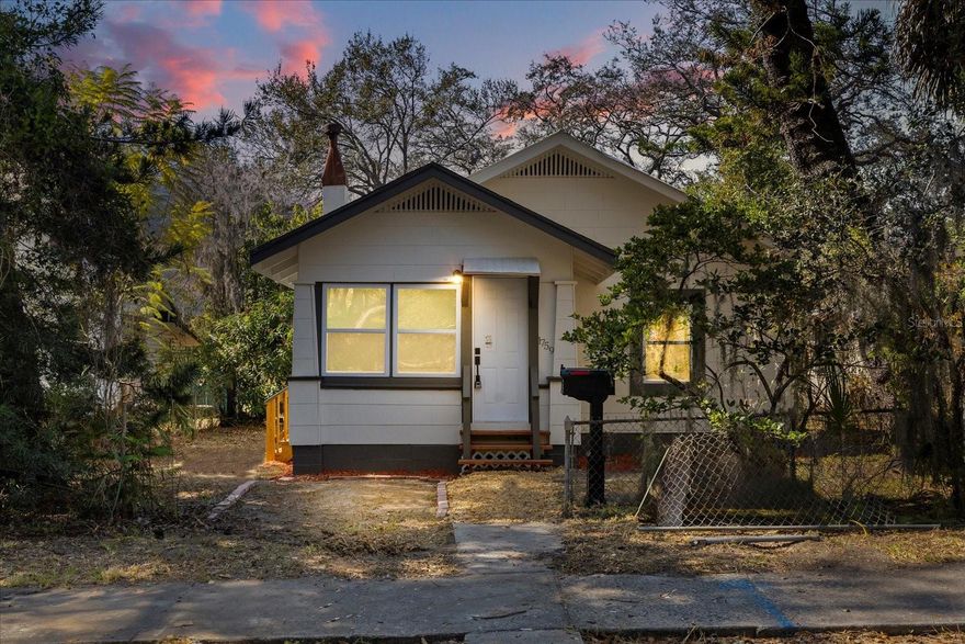ADORABLE ST PETE BUNGALOW STYLE HOME - On an over 6000 square foot lot! This home has been updated top to bottom - new windows, flooring, fixtures, water heater, AC - With renovated 2 bedrooms nearby selling over $300k, this is an amazing value! Upon entry, you will find the open and bright living with plenty of natural light spilling in, with the view of the beautiful kitchen (APPLIANCES TO BE PROVIDED BY SELLER PRIOR TO CLOSING.). The kitchen features new quartz throughout, backsplash, and cabinets!  The kitchen features a large bar which is perfect for meals and a work from home space!  Past the kitchen to your right are the two bright bedrooms, and the hallway full bathroom.  The hallway full bath has been updated top to bottom, and features a new commode, new tile throughout, as well as a vanity and fixtures.  Past the hall is the ensuite master bedroom, featuring a full bath!  This bedroom is also beautiful and bright, and features a sleek barn door to your closet to your right, and full bathroom to your left.  This bathroom also features a new commode, tile throughout, and fixtures.  The master bedroom has its own private access to the backyard!  The lot is huge and features fruit trees, fenced in from the back (there is a legal alleyway to enter from the backyard as well) and is perfect for those spring nights in St. Pete.  Come see this home today!!
