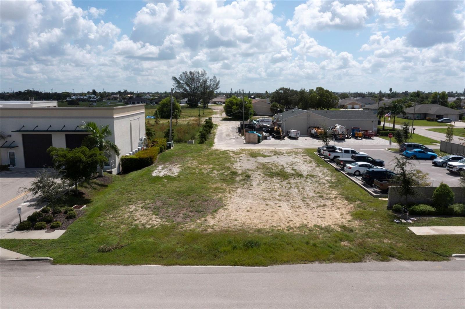 This outstanding commercial property offers two adjoining parcels sold together, providing a generous footprint for your business or development vision. Spanning approximately 0.235 acres, the site is already cleared and primed for immediate construction, streamlining your project timeline. Its prime location in one of Cape Coral’s fastest-growing commercial corridors ensures excellent visibility and quick access to major roadways, making it ideal for a wide range of business uses. Within minutes, you’ll find thriving retail centers, dining establishments, professional services, and key community amenities—creating a strong foundation for customer traffic and future growth. Whether you envision office space, retail, or a mixed-use project, this property’s size and location offer exceptional flexibility and potential. With Cape Coral’s expanding economy and robust infrastructure, this commercial lot is a rare opportunity to establish a presence in a high-demand market.