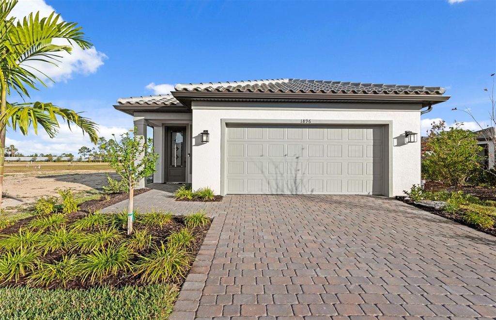 Photo of 1896 Ridgemore Street, North Port, FL 34289 (MLS # TB8437500)