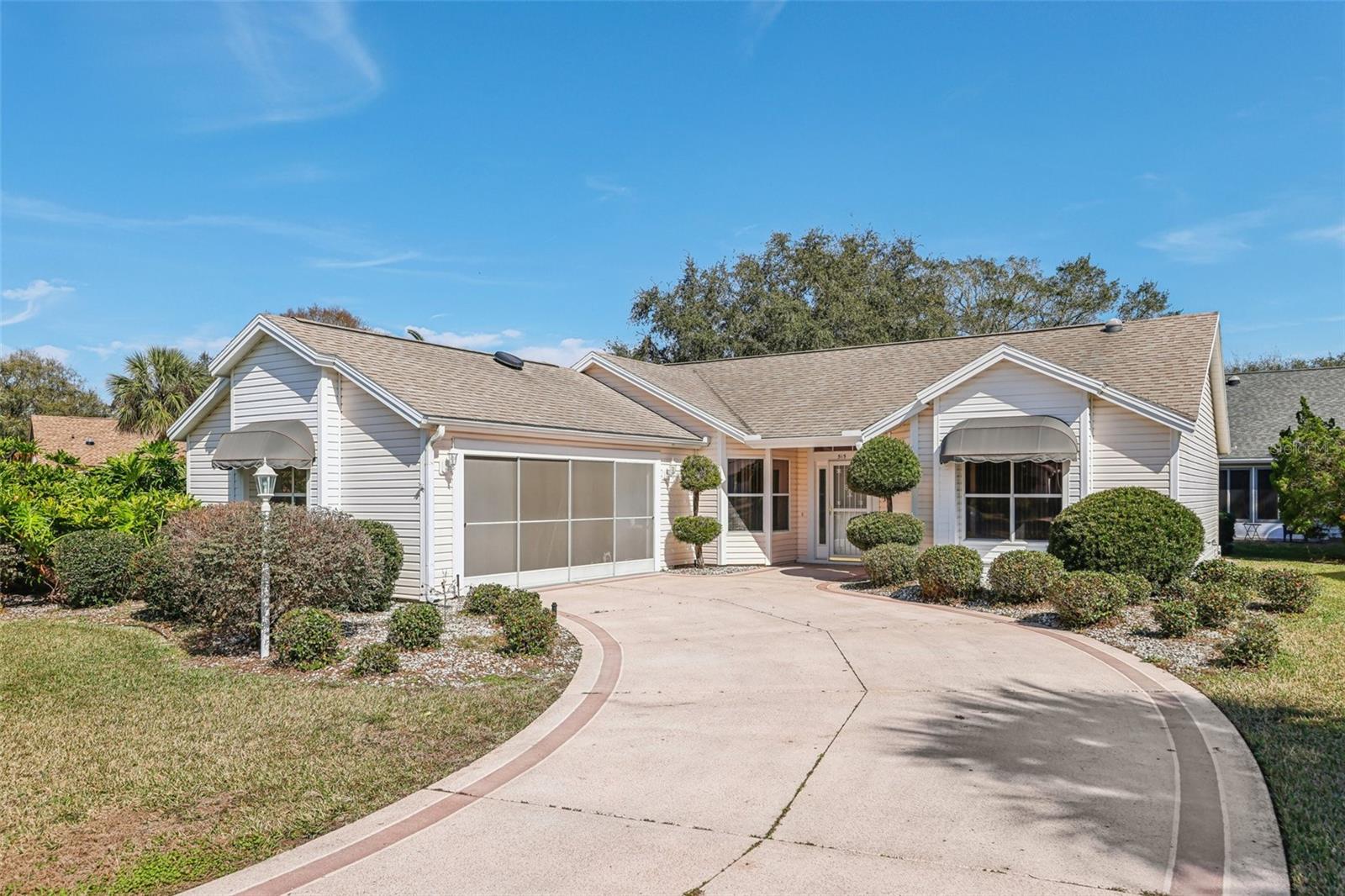 Welcome to the Villages - America's Friendliest hometown with every activity you could imagine and 100+ pools and rec centers to keep your days packed with adventure. 55+ community - PETS are welcome & GOLF CART INCLUDED! This is a gated location where the preferred method of travel is by golf cart. Every street even has lanes on each side specifically for golf cart travel lanes. Welcome home to a well maintained & spacious 2 bedroom / 2 bath home with high ceilings and an oversized yard, sliding doors to the patio & high ceilings. The master bedroom features a step in shower and walk in closet with a large bathroom vanity and ideal solar light to always keep natural light in the bathroom. The kitchen is spacious with lots of cabinets & counters with a newer dishwasher & refrigerator. There is no carpet which is ideal and all the walls are freshly painted. You will love the covered patio that overlooks the large yard with beautiful landscaping and plenty of space. The home has built in storm shades that are removable but offer another layer of protection. This home is ideally located on a quiet street in the established section of The Villages and in center of everything but within walking distance of the rec center that has billiards, pool, corn hole, pickle ball courts and so much more! Living in the Villages is completely 55+ is all about the lifestyle... start living your best life and call for your tour today! Tenant is responsible for the Activity Fee that is charged on the water bill & Lawn service is currently $60/m. Apply online ($50/person), view walk thru tour online. 600+ credit score is ideal with proof of income source. Tenant also pays HOA application fee of the application is approved by the owner and then a charge at $50/per person from HOA. Available immediately. Washer & Dryer & garage fridge is also included but not warranted.
