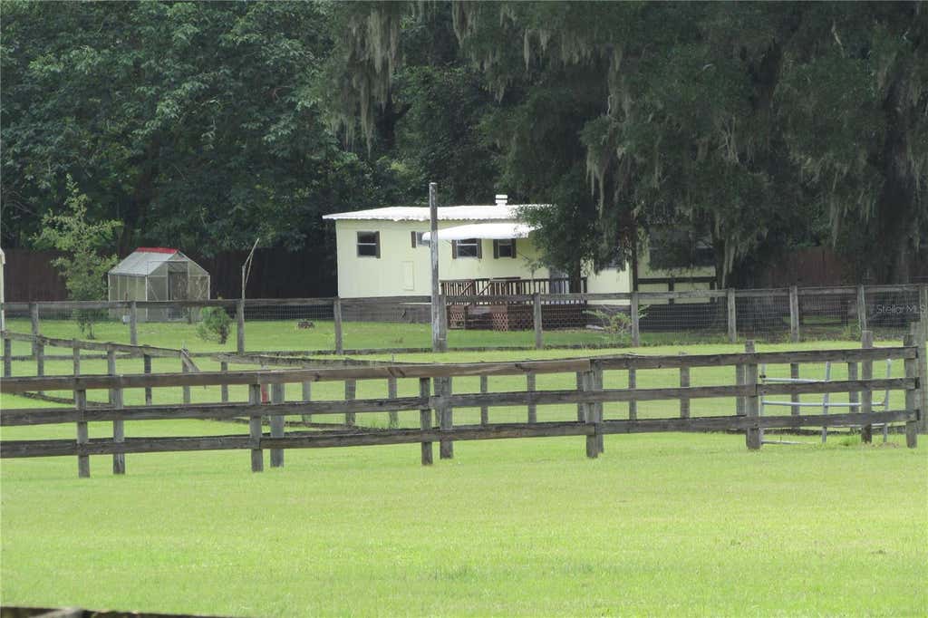 Photo of 10455 NW Gainesville Road, Ocala, FL 34482 (MLS # OM729078)
