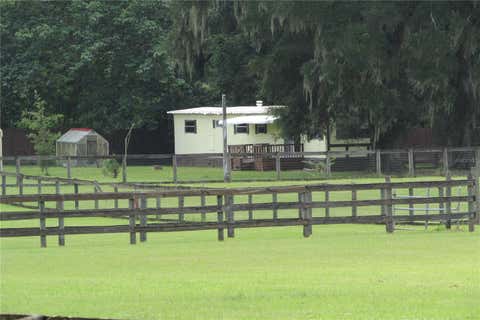 Photo of 10455 NW Gainesville Road, Ocala, FL 34482 (MLS # OM729078)