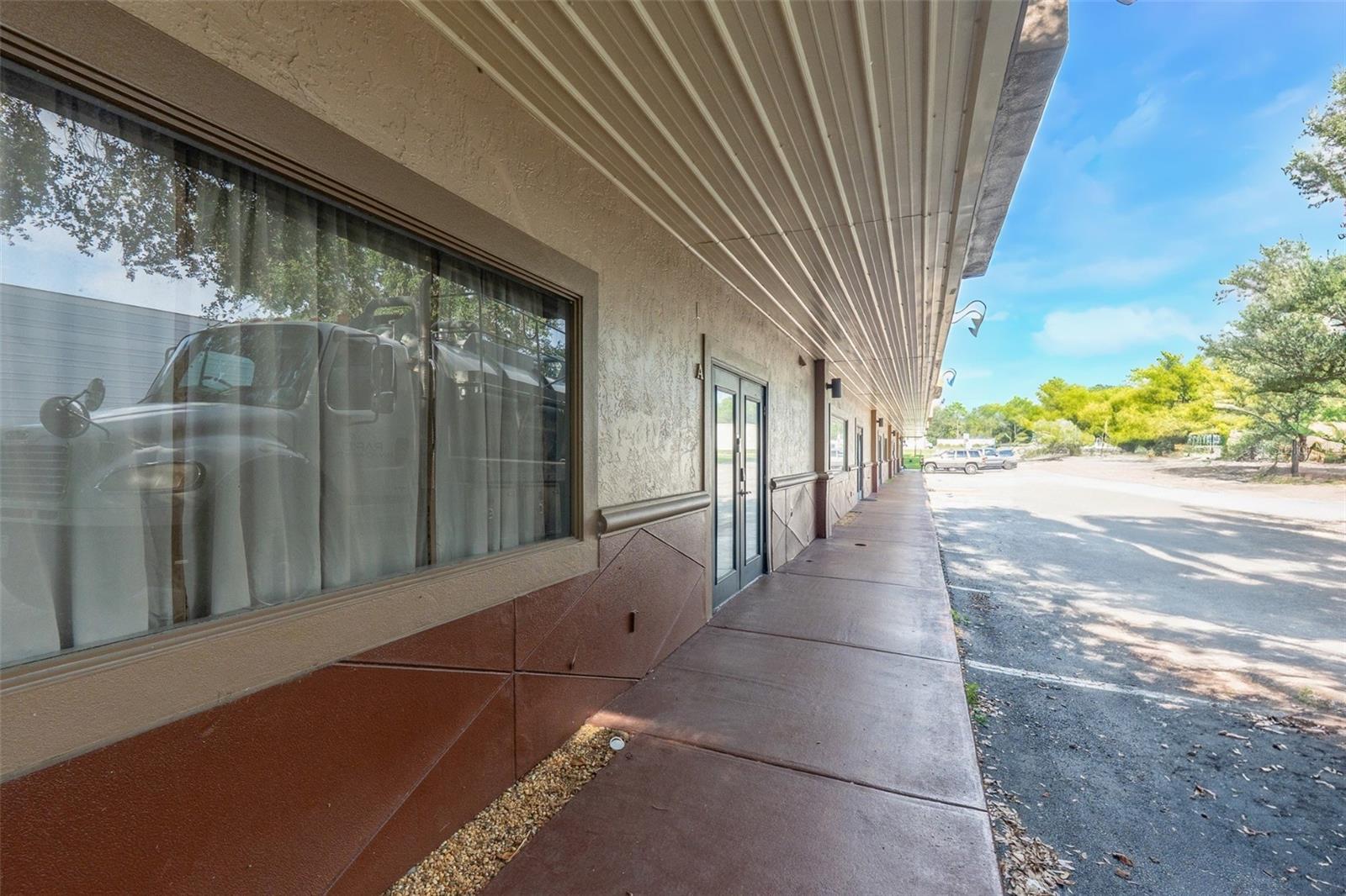 Available NOW - 1- 2,000 SF suite. Zoned I-1 (Industrial), enabling a broad range of allowable uses including general industrial, warehousing, distribution, light manufacturing, office/warehouse hybrids, and professional services. The almost fully air conditioned interior build out includes up to 3 private offices, a Reception area, Kitchenette, Conference room, and a Storage area, and a 12' roll up door. Metal frame construction with metal siding. Approximately 4 parking spaces directly in front of the unit. This industrial complex offers prime Regional Connectivity, situated just off US-27 on the Clermont/Minneola border, Minutes from US-Highway 27, State Road 50, the Florida Turnpike, and Nearby SR-429 for seamless routes to Orlando, Orlando International Airport, and broader Central Florida distribution corridors. Surrounding Amenities, Restaurants and Businesses include major retailers within walking or short driving distance, such as Publix, Walmart, BJs, Orlando Health, and more. Gross lease. Tenant responsible for tenants utilities and dumpster service. 5% Annual Increases. Call today to schedule a showing.