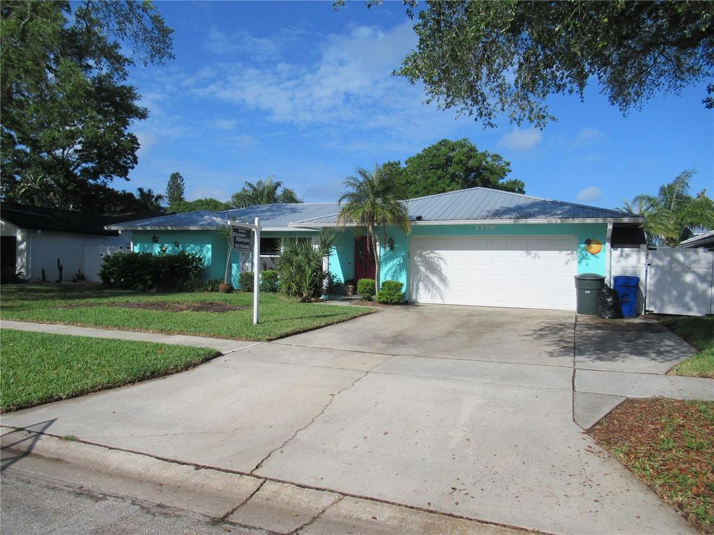 Photo of 1250 Dinnerbell Lane E, Dunedin, FL 34698 (MLS # TB8484123)