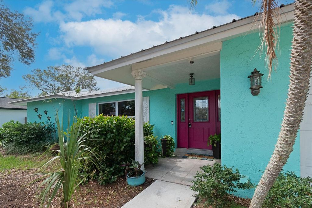 Photo of 1250 Dinnerbell Lane E, Dunedin, FL 34698 (MLS # TB8484123)