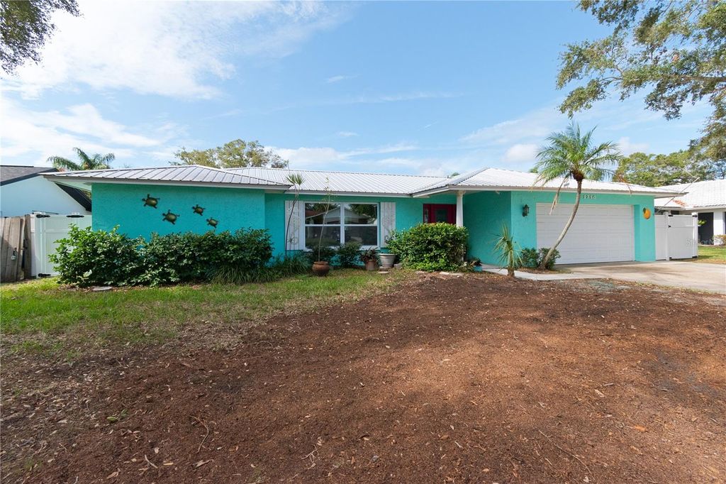 Photo of 1250 Dinnerbell Lane E, Dunedin, FL 34698 (MLS # TB8484123)