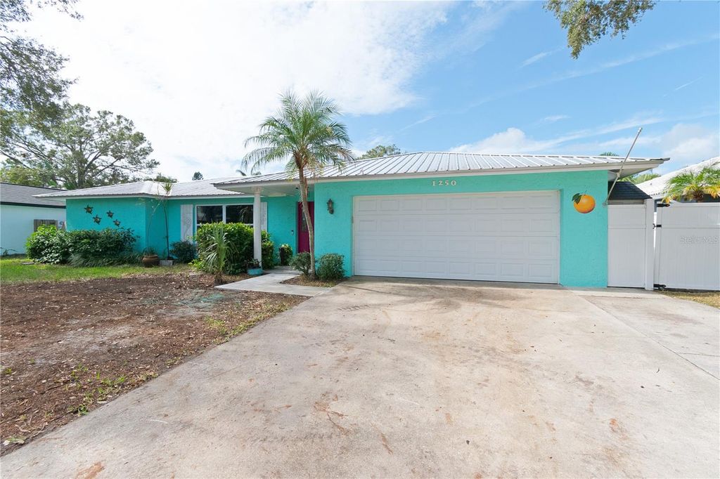 Photo of 1250 Dinnerbell Lane E, Dunedin, FL 34698 (MLS # TB8484123)