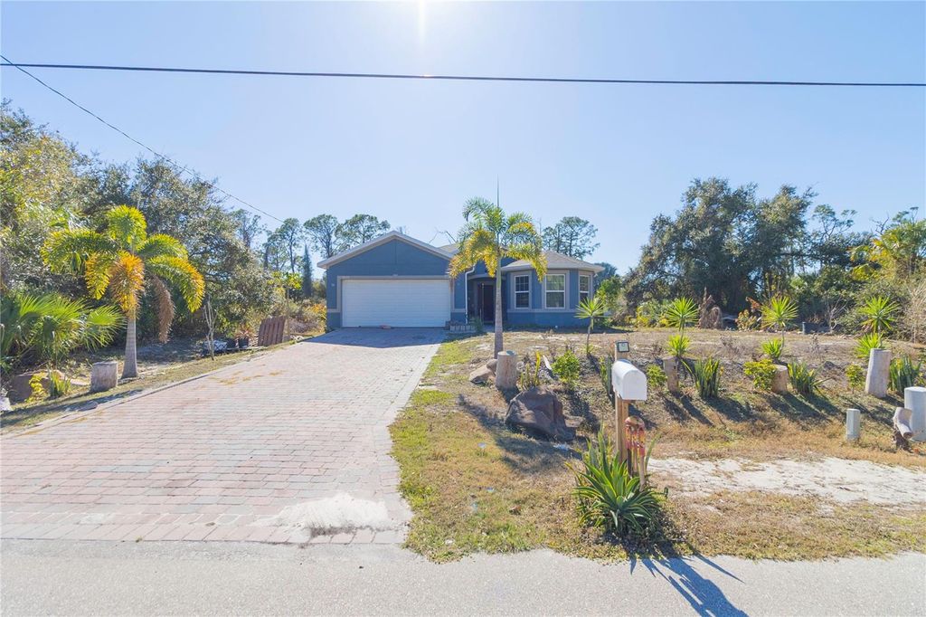 Photo of 1421 Oregon Lane, North Port, FL 34286 (MLS # TB8471827)