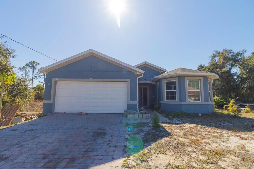 Photo of 1421 Oregon Lane, North Port, FL 34286 (MLS # TB8471827)