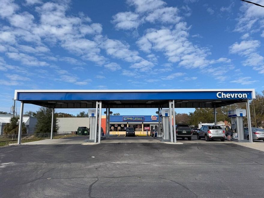 Exceptional Investment Opportunity – Chevron Gas Station, Convenience Store & QSR. Rare opportunity to acquire a high-performing Chevron gas station combined with a thriving convenience store and quick-service restaurant, offering a turnkey business with strong financials and long-term upside. Recently upgraded with Chevron’s latest brand imaging, including digital canopy pricing, the property presents a modern, high-visibility, and customer-friendly environment. The site features an expansive 5,000 SF convenience store equipped with a fully built-out QSR kitchen, walk-in coolers, and ample retail space. A Krispy Krunchy Chicken operates on-site, providing a strong and consistent food revenue stream that enhances overall profitability and customer retention. Fuel sales average approximately 50,000 gallons a month, with inside sales around $70,000 a month. The property benefits from steady traffic generated by nearby office and industrial parks. Recent renovations and rebranding further boost curb appeal and asset value.
Located in a prime Lakeland corridor, this recession-resistant asset offers multiple income streams, strong in-place performance, and significant growth potential—making it a standout investment opportunity.
