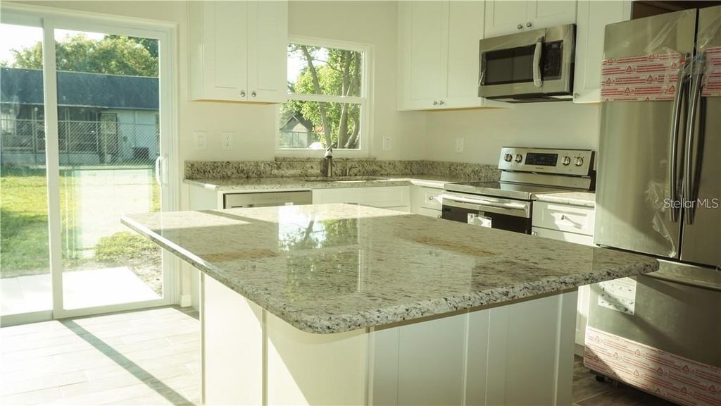 Photo of 3409 Vidal Street, New Port Richey, FL 34655 (MLS # TB8411310)