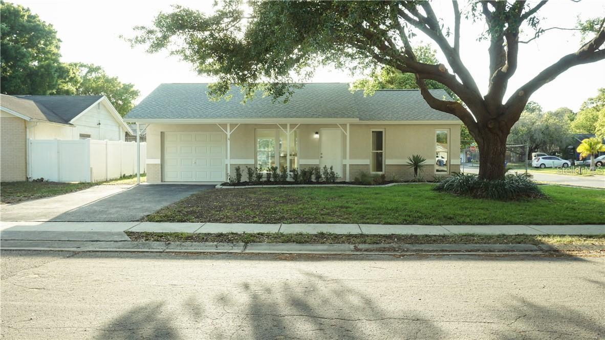 Welcome to this beautifully updat4ed 3-bedroom, 2-bathroom block home located on a spacious corner lot in a sought-after neighborhood in New Port Richey. Nearly everything in this home has been recently updated. Roof, AC, Water Heater and Hurricane impact windows are all 5 years old. Inside, the home offers an open floor plan with cathedral ceilings and 1,064 square feet of professionally renovated space, fully permitted and up to code. The interior has porcelain tile flooring throughout for quick and easy maitenance, neutral paint colors inside and out. The kitchen features modern granite countertops, modern backsplash, stainless steel appliances, and a clean, stylish design. Both bathrooms are fully updated with quality finishes. NO HOA and NO CDD Fees. LOW Flood insurance but house is high and dry, no flooding in recent hurricanes and no damage.
Don’t miss your chance, Schedule your private showing today and experience the charm for yourself.