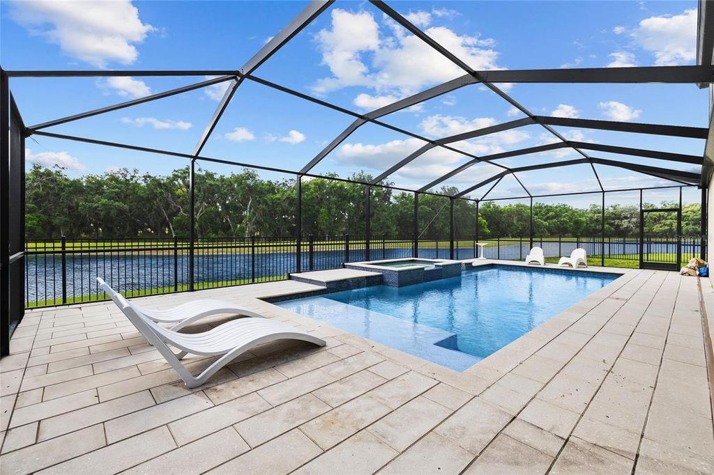 Photo of 12940 Steed Trace Loop, Lithia, FL 33547 (MLS # TB8497238)