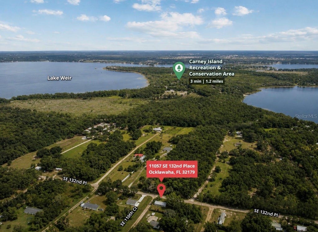 Photo of 11057 SE 132nd Place, Ocklawaha, FL 32179 (MLS # R4911816)
