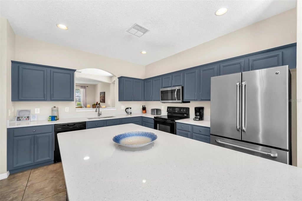Photo of 8538 Sunrise Key Drive, Kissimmee, FL 34747 (MLS # O6440479)