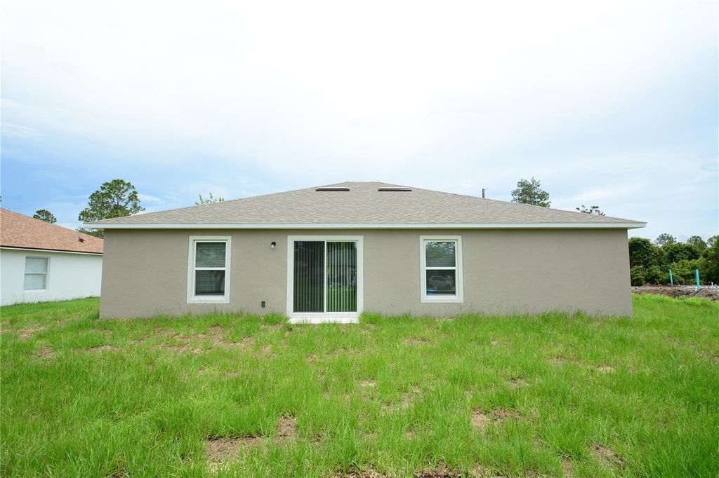 Photo of 6 Rosalie Place, Palm Coast, FL 32164 (MLS # FC317533)