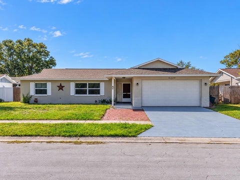 Photo of 5045 Brownstone Lane, New Port Richey, FL 34653 (MLS # W7890394)
