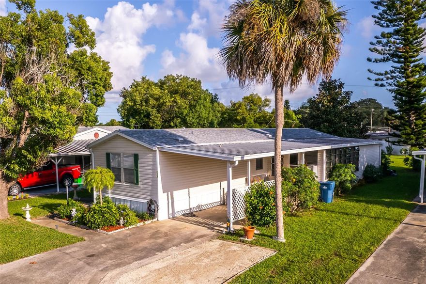 Beautiful 2 bedroom, 2 bath turn key home in Edgewater's Terra Mar Village! Enjoy the space of the split bedroom and open floor plan. Relax with peace of mind! This home has a new roof 2020, new AC 2020, new flooring, remodeled kitchen and bathrooms, inside laundry, a carport, enclosed porch, and a huge storage room! Boaters take note! There is available boat storage in the community for just $35 month! Terra Mar Village also has a private boat ramp and launch, 300 ft fishing pier, 2 saline swimming pools, bocce, shuffle board courts and more! Located on the Intracoastal across from Canaveral National Park, this community perfectly encapsulates that "Old Florida Charm." ;Water: City