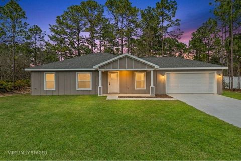 Photo of 11107 Wood Owl Avenue, Weeki Wachee, FL 34614 (MLS # W7883415)