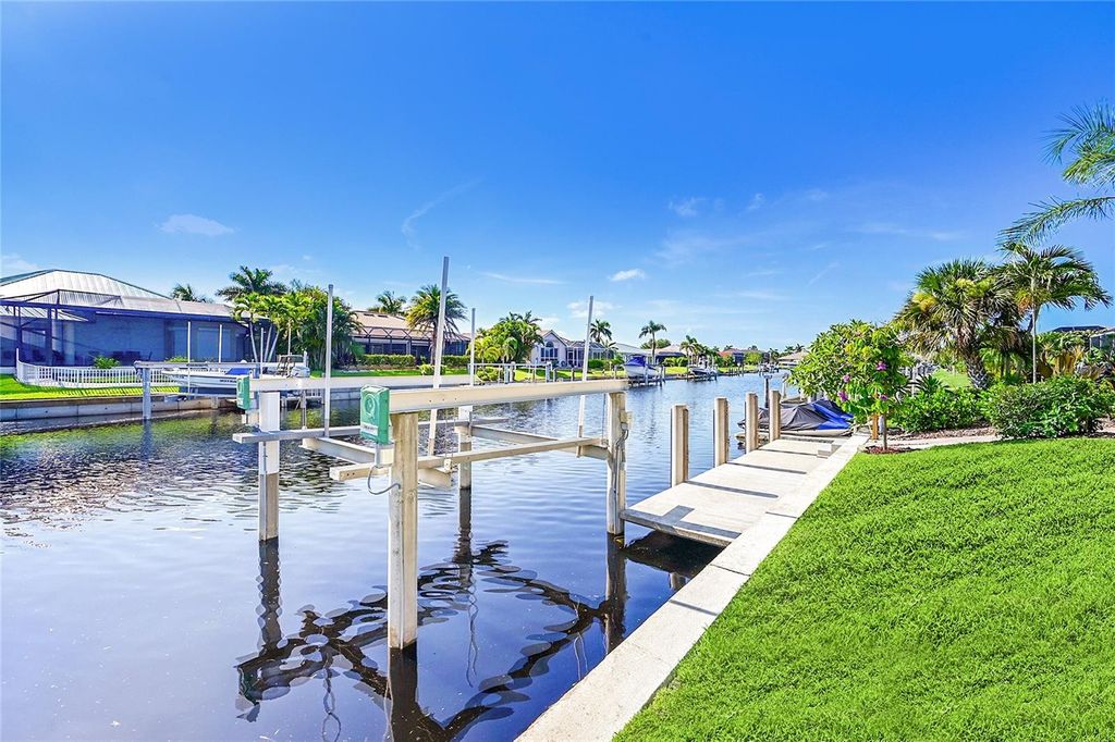 Photo of 310 Caicos Drive, Punta Gorda, FL 33950 (MLS # C7512387)