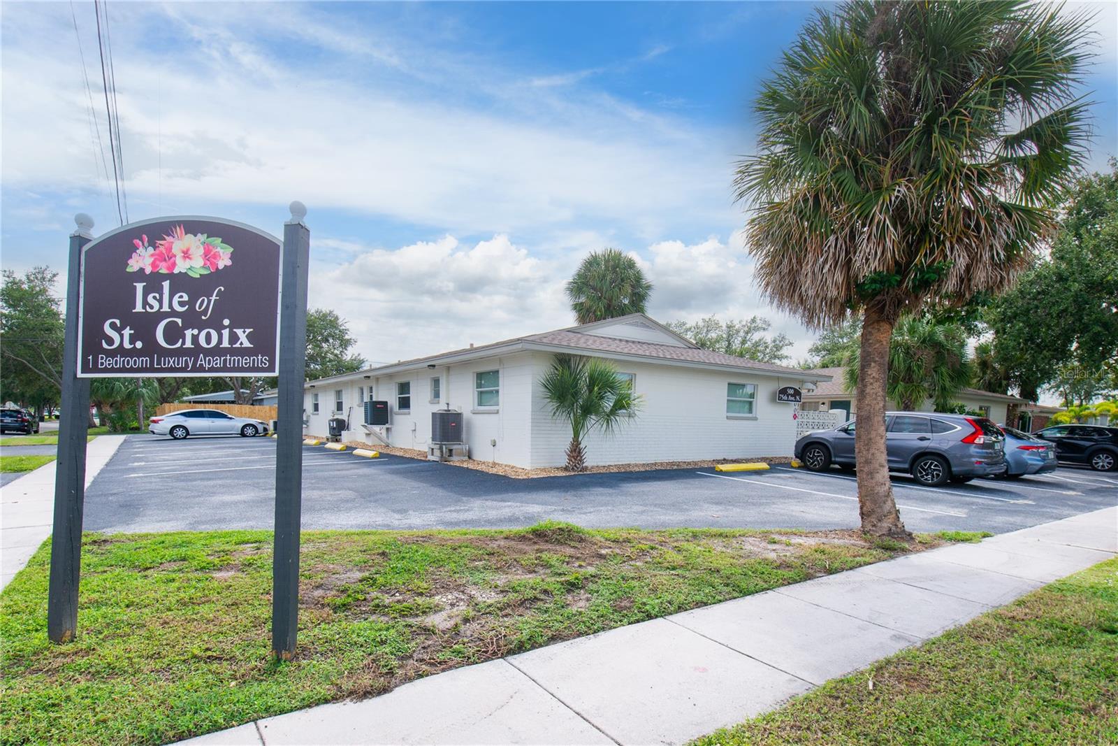 The Isle of St. Croix Apartments is a rare investment opportunity in the highly desirable Fossil Park area of St. Petersburg. This well-maintained, single-story community consists of 10 spacious 1BR/1BA units of approximately 600 SF each, across three concrete block buildings inclusive of a shared laundry room. Each apartment features a large living area, eat-in kitchen with shaker cabinets, granite countertops, breakfast bar, oversized bedroom with walk-in closet, and a private patio space. Ideally located just minutes from Downtown St. Pete, I-275, and the vibrant 4th Street corridor, offering convenient access to premier shopping, dining, and employment centers. Tenants pay electric and water/sewer (billed back), while the owner covers trash, lawn and pest service. Fully occupied with historically low vacancy, this property is a strong turnkey multifamily investment in a prime central location.