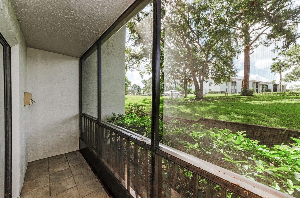 Photo of 2575 Pine Ridge Way S #E1, Palm Harbor, FL 34684 (MLS # TB8532803)