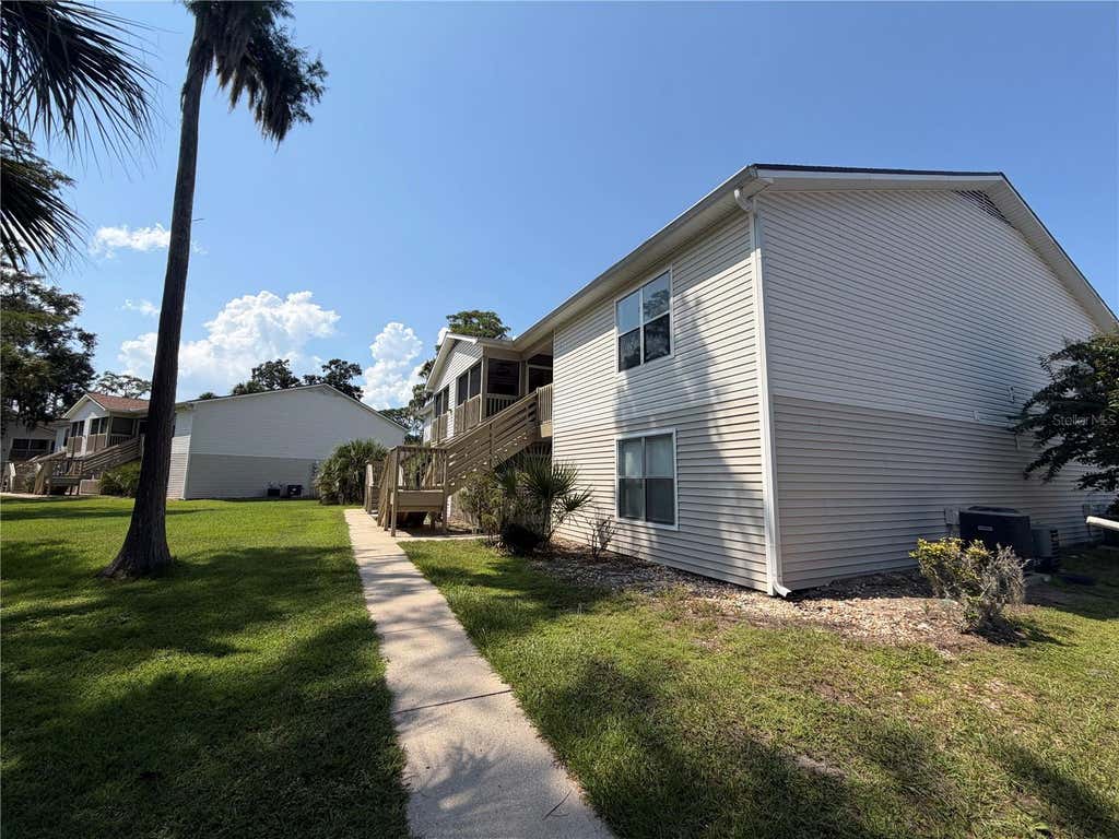Photo of 1600 Big Tree Road #A6, Daytona Beach, FL 32119 (MLS # O6435907)